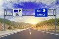 Two options EU and Greece on road signs on highway Royalty Free Stock Photo