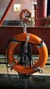 Two orange life preservers hung for use Royalty Free Stock Photo