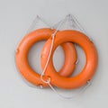 Two orange life rings Royalty Free Stock Photo