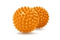 Two orange spiny massage balls isolated on white. Concept of physiotherapy or fitness. Closeup of a colorful rubber ball