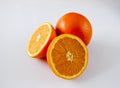 Oranges whole and half daylight Royalty Free Stock Photo