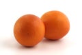 two oranges on a white background Royalty Free Stock Photo