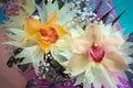 Two Orchid closeup of a bouquet of three orchids beautifully decorated on wooden background concept birthday flowers