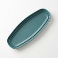 Two Teal Oval Serving Platters Stacked on a White Surface serving dish turquoise Royalty Free Stock Photo