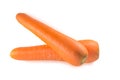 Two overlapping fresh orange carrots isolated on white background in strange appearance Royalty Free Stock Photo