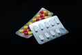 Two packages of tablets in blisters, capsules Royalty Free Stock Photo