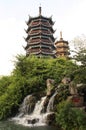 Two Pagodas and a waterfall in Guiling, China Royalty Free Stock Photo