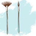 Two painting brushes on a light blue background.