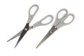 Two pair stainless steel universal scissors on a white background