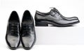 Two pairs of black male classic shoes