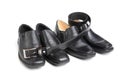 Two pairs black man's shoe and a belt