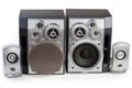 Two pairs of different home loudspeaker systems on white background Royalty Free Stock Photo