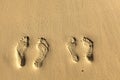 Two pairs footstep on the beach