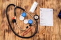 two pairs of lenses with a stethoscope and a prescription from a doctor spread out on the table Royalty Free Stock Photo