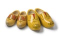 Two pairs of traditional yellow Dutch wooden shoes Royalty Free Stock Photo