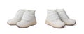 Two pairs of warm white sneakers isolated on a white background Royalty Free Stock Photo
