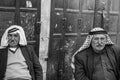 Two palestinian men are sitting having a chat an zigarettes in t Royalty Free Stock Photo
