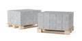 Two pallets of cement or concrete brick stones stacked on white background, construction, building trade or masonry industry