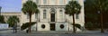 Two palms in front of historic home in Charleston, SC