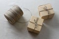 Two paper boxes and reel of thread Royalty Free Stock Photo