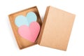 Two paper hearts in cardboard box with lid isolated on white background. Pink and blue hearts cut from paper Royalty Free Stock Photo