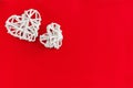 Two Paper hearts, weaved, white, Isolated hearts on red background Royalty Free Stock Photo