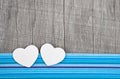 Two paper hearts on wooden grey shabby background Royalty Free Stock Photo