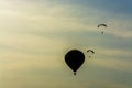 Two para motor glider and hot air balloon Royalty Free Stock Photo