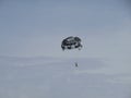 Two parachutists fly on the same black-and-white parachute, Parasailing for two Royalty Free Stock Photo