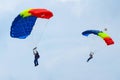 Two parachutists ready to land - skydiving - parachute