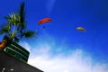 Two Paragliders on a Blue Sky in Lima - Peru