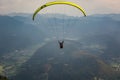 Two paragliders tandem flying over Alps mountains in summer day Royalty Free Stock Photo