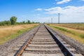 two parallel railway tracks extending into the distance