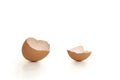 Two parts of a broken empty egg shell on a white background Royalty Free Stock Photo