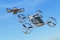 Two Passenger Drone Taxis flying in the sky Royalty Free Stock Photo