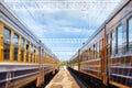 Two passenger trains on one platform