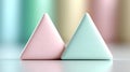 Two pastel-colored triangular prisms are featured prominently, one pink and the other light blue Royalty Free Stock Photo
