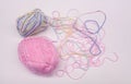 Two Pastel Pink, Periwinkle, Yellow and Mint Green Skeins of Yarn