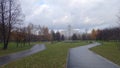 Two paved roads in the Park. Autumn