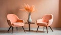 Two peach colored armchairs and vase with dried flowers near peach colored wall. Color of the year 2024