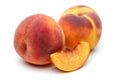 Two Peach and slice on white background Royalty Free Stock Photo
