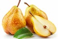Two pears with a leaf on top and one cut in half Royalty Free Stock Photo