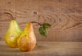 Two pears on a plank wooden background Royalty Free Stock Photo