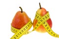 Two pears with tape measure on waistes.