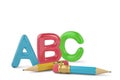 Two pencils and color ABC letters on white background 3d illustration. Royalty Free Stock Photo