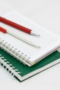 Two pens on the notepad Royalty Free Stock Photo