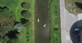 Two people on a boat floating on the river.