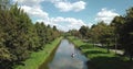 Two people on a boat floating on the river.