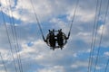Two people on the bungee ride bottom view Royalty Free Stock Photo