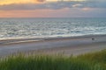 Scenic sunset over the beach in Vejers Strand at the Danish North Sea coast during summer Royalty Free Stock Photo